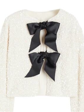 A Loves A White Sequin Jacket with Black Bow Closures